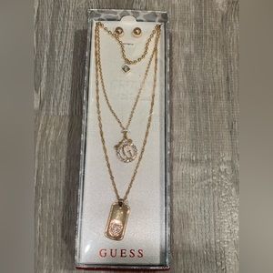 Guess earrings and necklaces